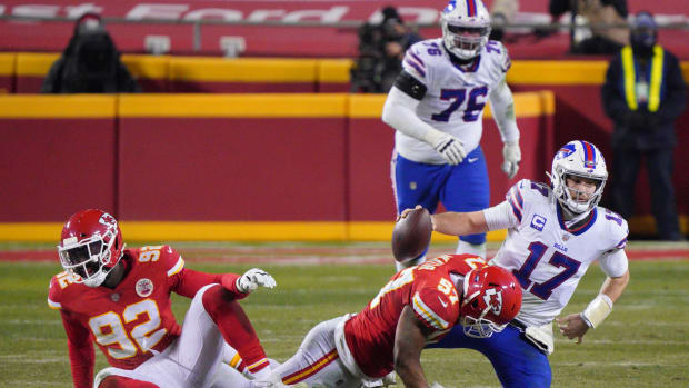 Alex Okafor tackling Josh Allen in AFC Championship game